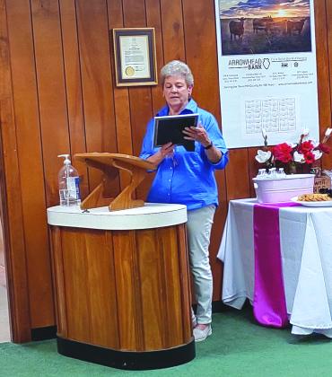 Gale Ivy reading the Keep San Saba Beautiful/Keep America Beautiful President’s Recognition Award