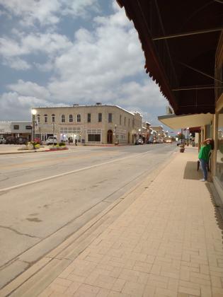Downtown lights came on during 2nd Contact Phase just before totality. You can see Yvonne Contreras of San Saba News &amp; Star on the right waiting for totality. - See Totality article on Front Page.                                                                                       Photo by Djuana Payton, Editor