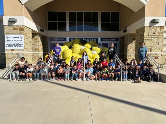 San Saba Elementary 3rd Grade students and their teachers collected 5,486 plastic bottles in response to the challenge set by the KSSB! They are pictured here in front of one of four large loads of plastic bottles!