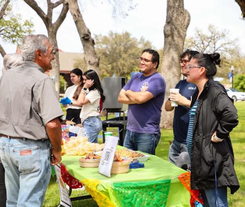 HPU student organizations and alumni groups hosted booths at the Spring Family Reunion. Pictured here are the Hispanic Alumni Association hosting the cookie booth.