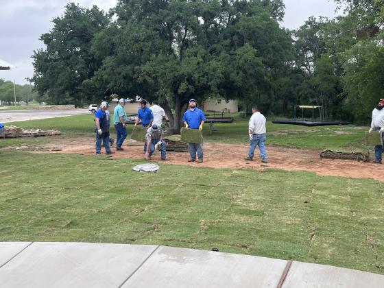 Street, Water, and Parks Department crew members working hard at the Splash Pad