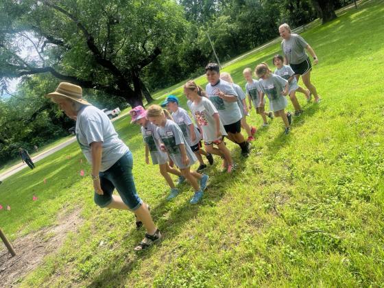 Kampers march in line to their next activity.