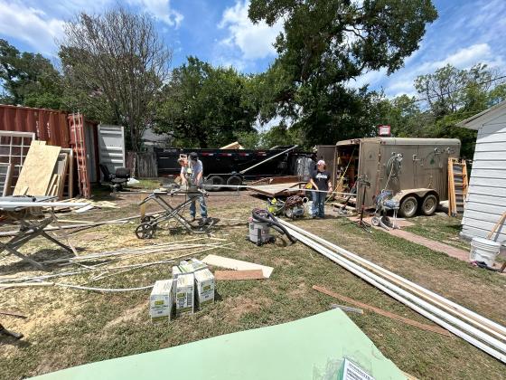 Final push on Saturday to get the house finished - Photo courtesy of Corina Fauley