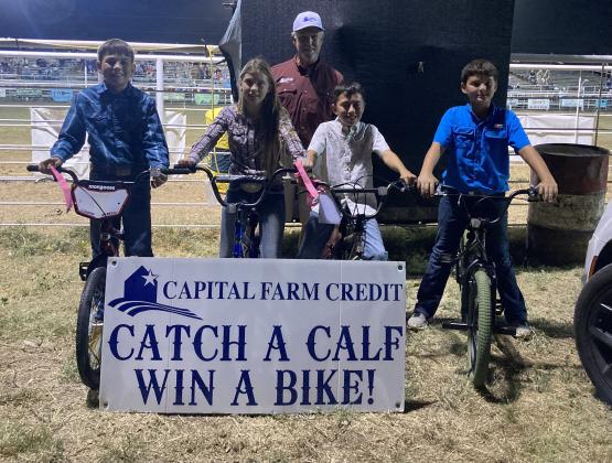 Capital Farm Credit Calf Scramble winners- Friday night Left to right- Gavin Jolly, Macy Meador, Brian Rocha, and Sloan Sanderson