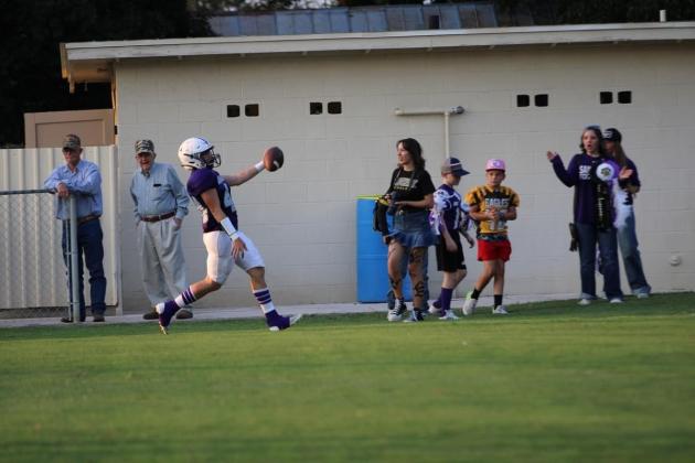 Kaylub Roberts celebrates as he goes into the end zone. Courtesy of Kayti Lackey - 1916 Athletics