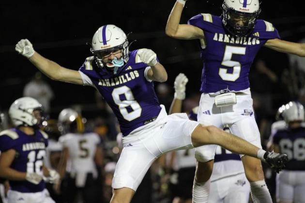 Preston Grey (#8) and Cash Bryant (#5) celebrate the big win. Courtesy of Kayti Lackey - 1916 Athletics
