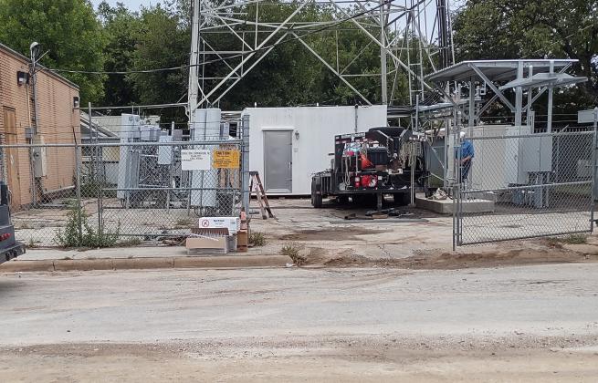 Inside that fence is the new equipment for the tower.