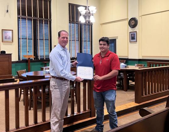 Congressman Pfluger presents award to Tegan Sartor