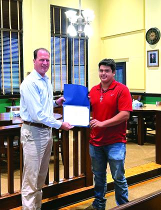Congressman Pfluger presents award to Tegan Sartor