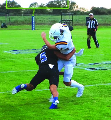 #5 EJ Aviles in the 62-15 Coyote win against St. Joseph. See story on Front Page.  Courtesy of Pam Starr