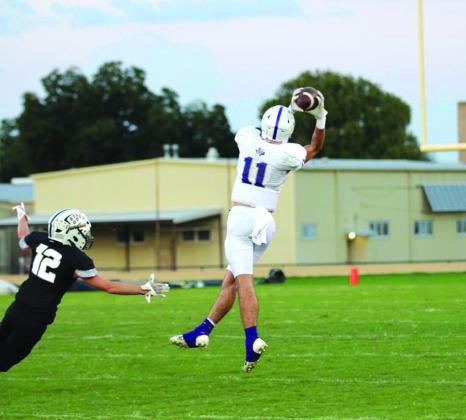 Levi Glover stretches out for the ball.   Photos courtesy of Kaytie Lackey - 1916 Athletics