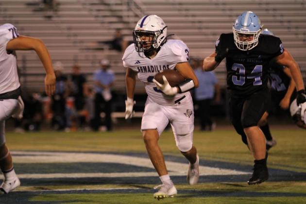 Rayland Saucillo takes off on a big run in last Friday’s victory over the Cougars. Photos courtesy of Kayti Lackey - 1916 Athletics