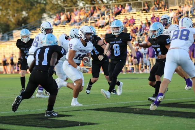 Alex Estrada goes in for the score in last Friday's win over the Cougars. Photos courtesy of Kayti Lackey - 1916 Athletics