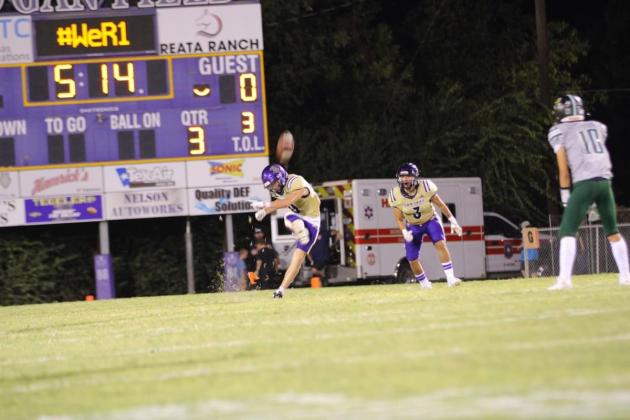 Preston Grey kicks off to the Eagles / Courtesy of Kayti Lackey - 1916 Athletics