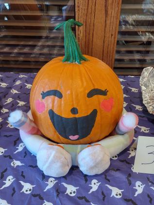 4th Place - Baby Pumpkin by Naomi Saucillo  / Photo by Djuana Payton
