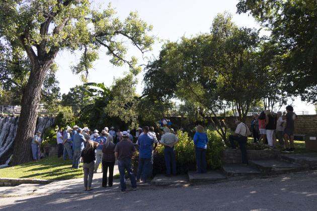 Crowd gathering at the falls for the Farrel Whitley Appreciation Day event