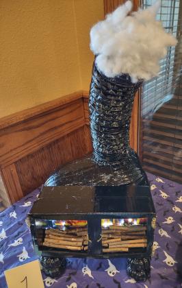 1st Place - Fireplace Pumpkin by Amanda Rivera  / Photo by Djuana Payton