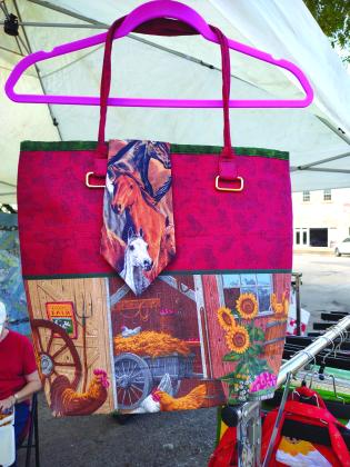 Your Pocket Tie can be displayed on a purse or bag