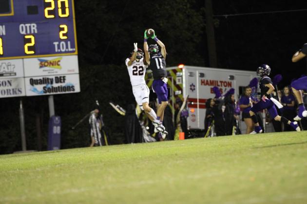 Levi Glover goes up high for the interception in last week’s game. / Courtesy of Kayti Lackey - 1916 Athletics