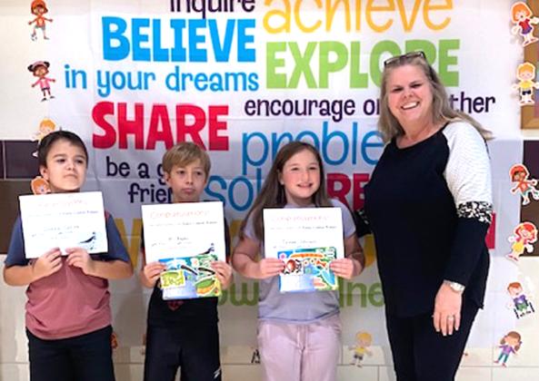 Fourth Grade Bird Poster Contest:  Dominic Collins, MJ Bagley, Tessa Johnson, Kelley Cash (teacher)