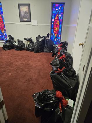 Angel Tree volunteers have sorted, wrapped, and bagged up the gifts for each child.