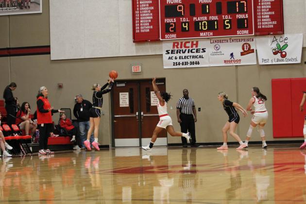 #1 Olivia Sebastian sinking a 3-pointer against Salado