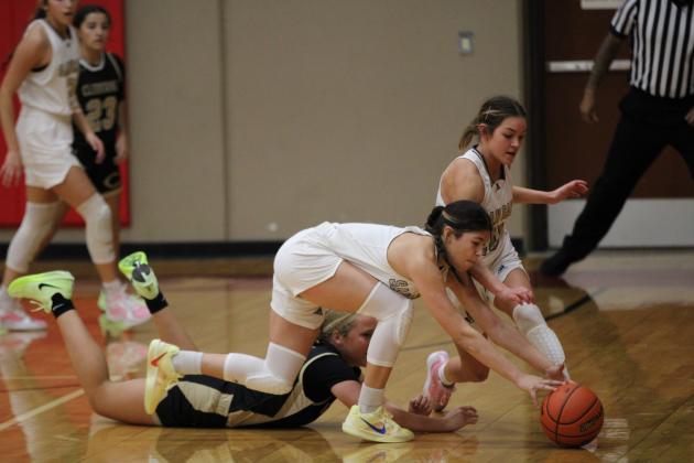 #11 Chassidy Gonzalez and #20 Ema Argote hustle after lose ball against Cleburne in championship game