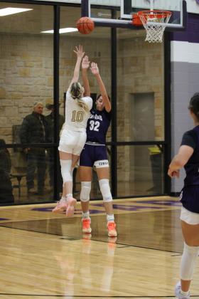 #10 Brooklyn Allison takes the lane for a layup