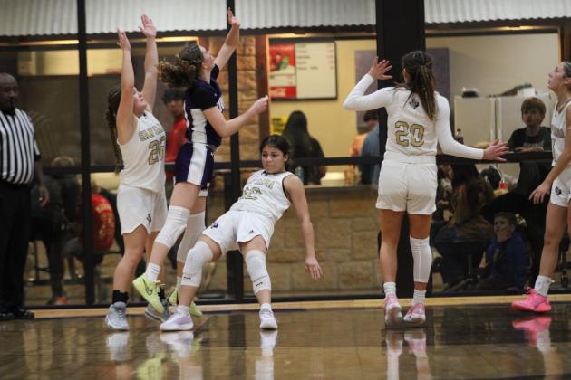 #12 Aaliyah Patino taking a charge