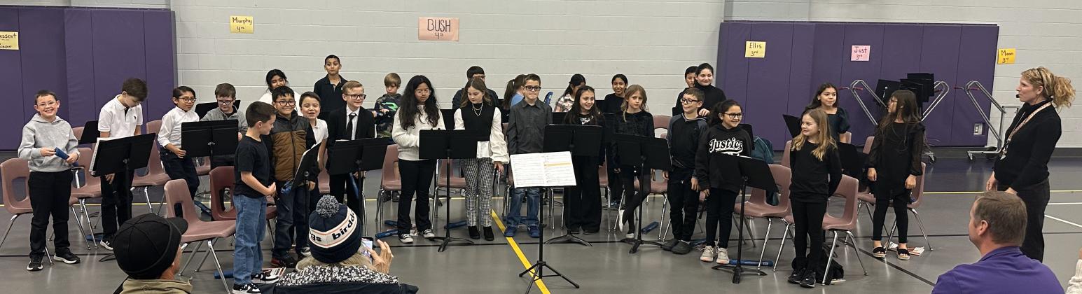 SS Elementary 4th grade Recorder Class taking a bow after concert - courtesy of Courtney Keuhl
