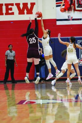 #2 Cinzlea Stanton putting hands on ball-stopping a score in the Regional finals game