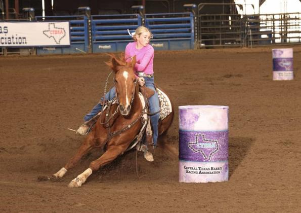 Sydni setting a record for Barrel Racing in Llano last Saturday. Courtesy of  Ricci Grimes-Jones