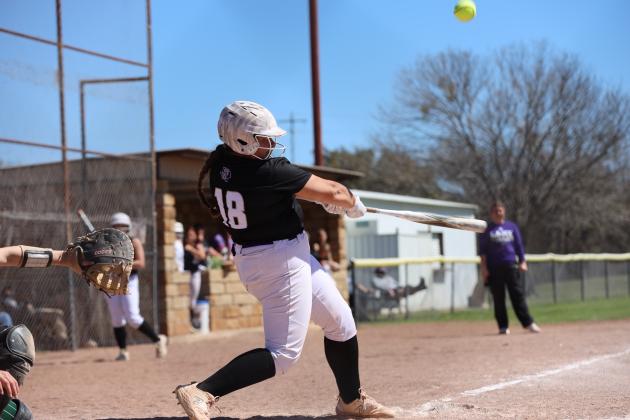 #18 Mikayla Lusty connecting against Monday’s district game against Harper