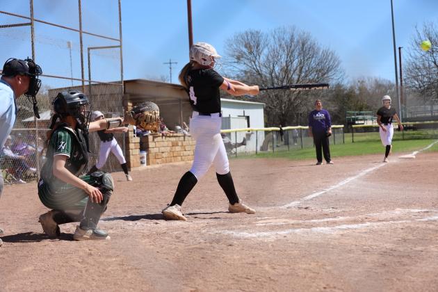 #4 Bryli Edmondson makes a line drive, batting in 2 runners