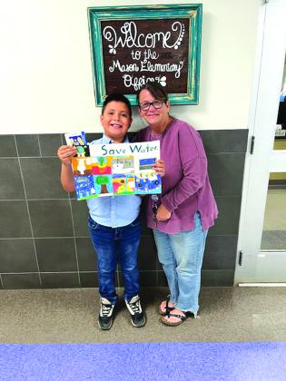 Mason Elementary 4th Grade Erick Hernandez was the Second Place winner, and is pictured here with his teacher, Mrs. Taylor.