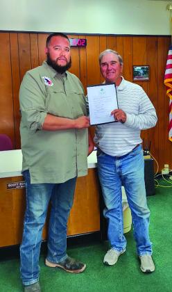 Mayor Pro-Tem Robert Whitten (right) presented a Certificate of Recognition for Outstanding Recycling Efforts in 2024 to Juan Montoya (right), Sanitation Department Supervisor, and to the City of San Saba. Photo by Djuana Payton