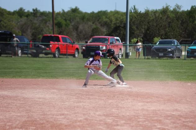 #3 Short Stop Corbin Knight with a tag out at second base