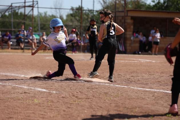 #7 Hadley Craft racing her way to first base