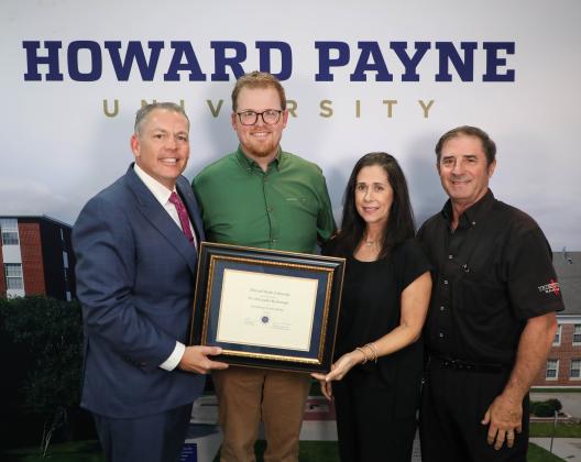 Dr. Chris Rosborough was named the recipient of HPU’s Outstanding Faculty Member Award. Pictured from left to right are Dr. Cory Hines, HPU president; Dr. Chris Rosborough; and Lisa Underwood and Leo Underwood, representing Underwood’s Cafeteria.