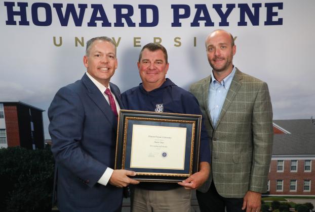 Aaron Diaz (center) received HPU’s Outstanding Staff Member Award. He is pictured with Dr. Cory Hines (left) and Tanner Spears of Porter Insurance/BKCW Agency (right).