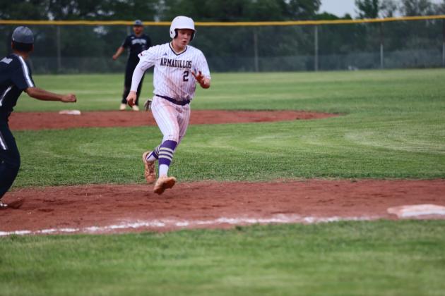 #2 Graden Lebow racing to 3rd base