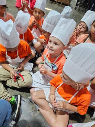 SSES Kinder student Reagan Anderson, with that huge smile, looks like he was having a blast on the field trip to Millican Pecan Company!