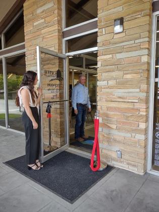 Marcus Amthor heading outside for the Ribbon Cutting Ceremony  | Photo by Djuana Payton