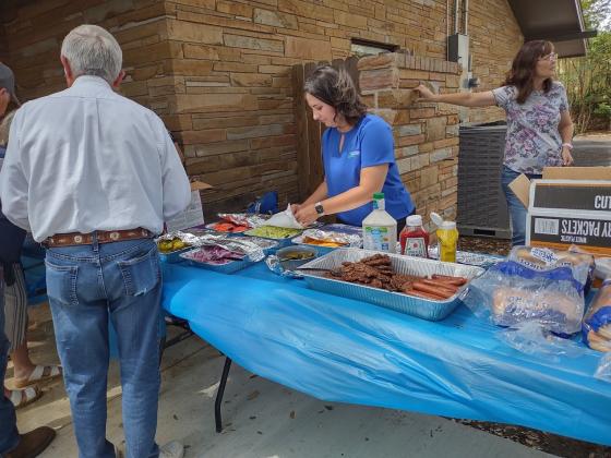 Hamburgers, hot dogs, chips, cookies, and tea were in abundance for those to attended.  | Photo by Djuana Payton
