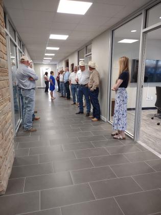 Folks lined up in the hall waiting for the Ribbon Cutting event to start.  | Photo by Djuana Payton