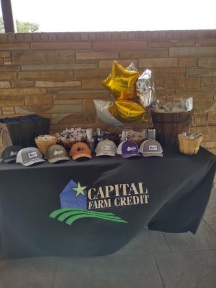 Table of goodies just outside the door as you arrive for the Ribbon Cutting Ceremony.  | Photo by Djuana Payton