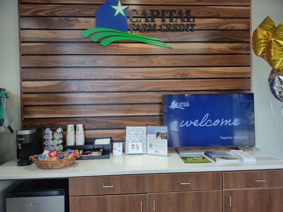 Table inside the lobby welcomes all who enter the office of Capital Farm Credit. | Photo by Djuana Payton