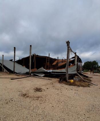 Part of a storage building that belongs to Riggs Feed destroyed by the storm. | Photo by Carolyn Preece