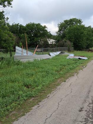 This photo was taken on China Creek Road in San Saba (This was part of a Riggs Feed storage building destroyed by the storm.) | Photo by Carolyn Preece