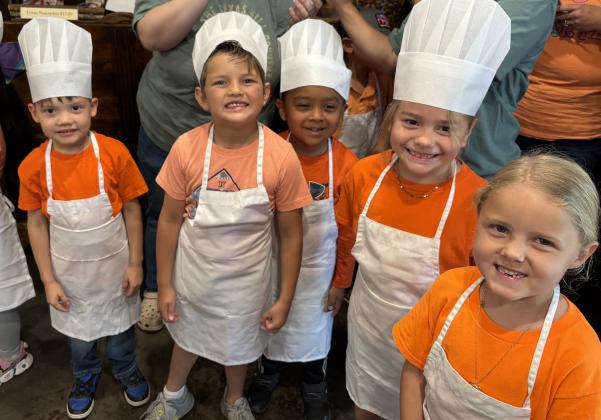 SSES Kinder students Dante Paez, Easton Sanderson, Fabian Macias, Elliana Whitley, and Ellie Murphy were all decked out in their aprons and bakers hats at their Millican Pecan Company Field trip!